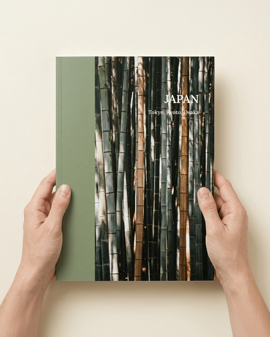 Several photo books in different sizes arranged on a table for comparison