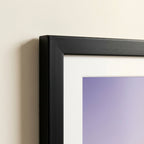 Close-up corner detail of a Classic Framed Print in black wood frame