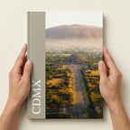 Layflat Edition photo book in A4 portrait held in hands to show physical size