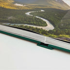 Layflat Edition photo book opening to a perfectly flat panoramic spread